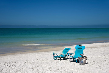 Fototapeta na wymiar Blue Beach Chairs
