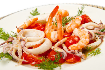 dish with tomatoes and squid