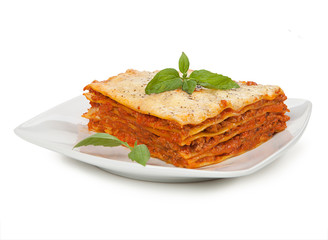 Tasty lasagna isolated on plate
