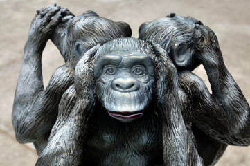 Fototapeta na wymiar Three wise monkeys or Three Mystic Apes sacred ancient icon