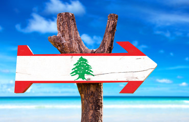 Lebanon Flag wooden sign with beach background