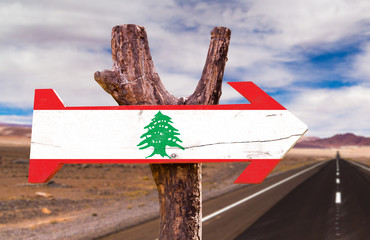 Lebanon Flag wooden sign with desert road background