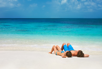 Fototapeta na wymiar Young couple on the tropical beach