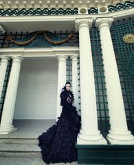 Fashion model in black dress