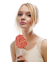 fashion blond woman  holding lollipop