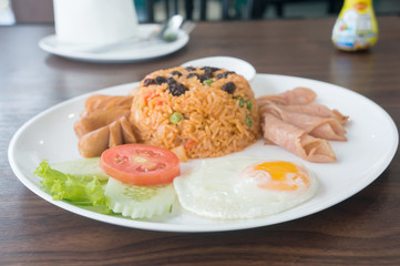 Thai American fire rice on wood table
