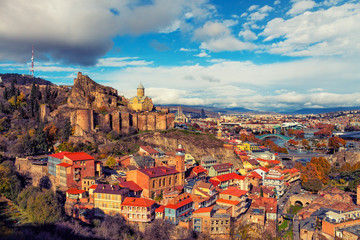 Beautiful panoramic view of Tbilisi at sunset, Georgia country - obrazy, fototapety, plakaty