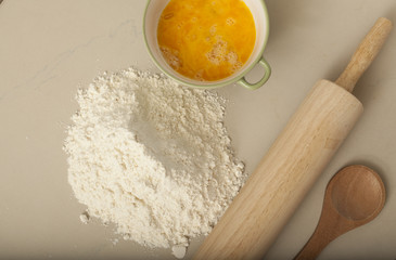 pasta homemade preparation set egg flour olive oil with roller