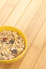 Delicious and healthy cereal in bowl with milk