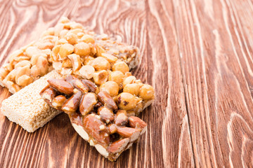 Peanut brittle sweet hard on wooden table