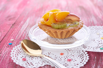 sweet cake with fruits on plate