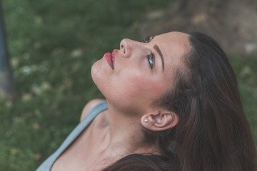 Portrait of a beautiful curvy girl posing in an urban context