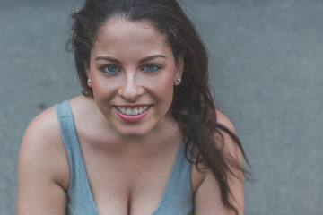 Portrait of a beautiful curvy girl posing in an urban context