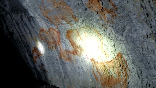 Ancient figure in cave