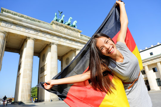German flag woman happy at Berlin Germany