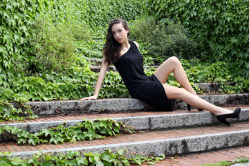 Sensual young woman portrait outdoors in a park