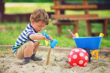 Little kid playing around the playground © steevy84