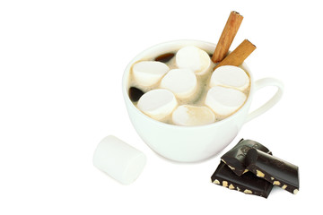 A cup of hot chocolate with marshmallows and chocolate isolated