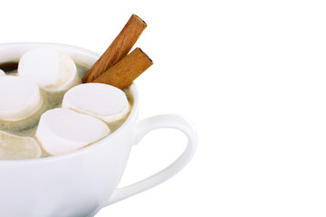 A cup of hot chocolate with marshmallows and chocolate isolated