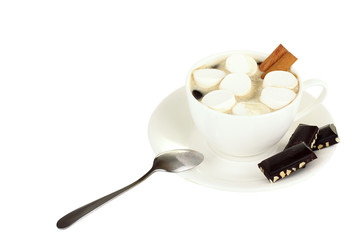 A cup of hot chocolate with marshmallows and chocolate isolated