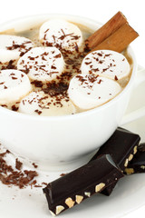 A cup of hot chocolate with marshmallows and chocolate isolated