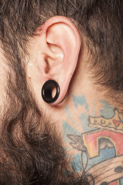 male ear with a ring