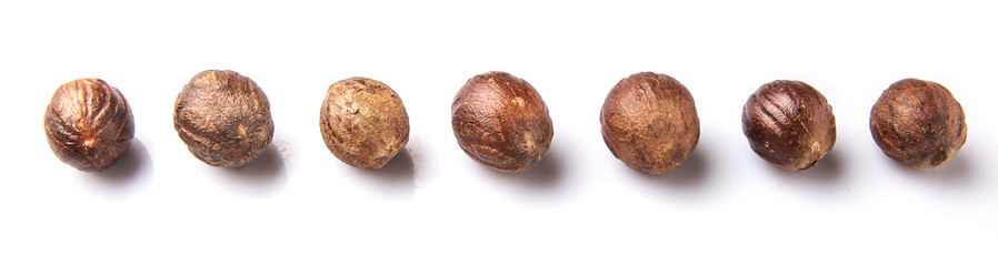 Nutmeg over white background