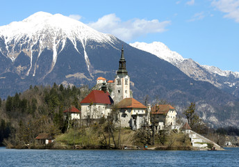 island of Lake BLED in SLOVENIA and the snowy mountains