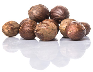 Nutmeg over white background