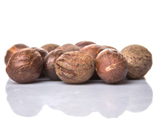 Nutmeg over white background