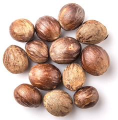 Nutmeg over white background