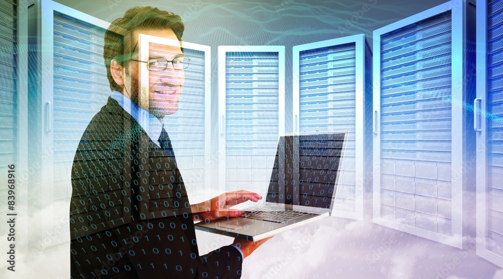 Poster Composite image of smiling businessman using a laptop 