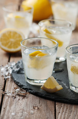 Homemade lemonade with lemon and ice
