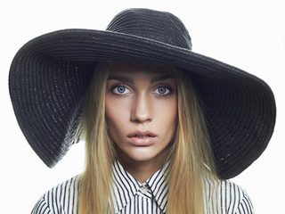 Beautiful Blond Woman in Black Hat. Elegance Beauty Girl