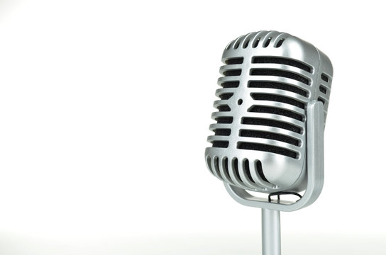 Vintage silver microphone on white background