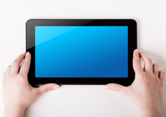 tablet pc with a blank screen in the hands. Business, technology