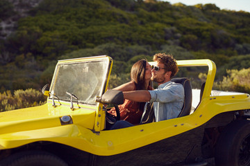 Affectionate young couple on a roadtrip