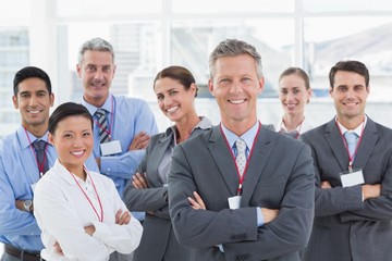 Fototapeta premium Business people looking at camera with arms crossed