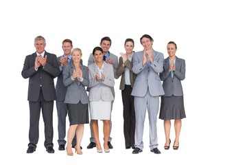 Obraz premium Smiling business team applauding at camera