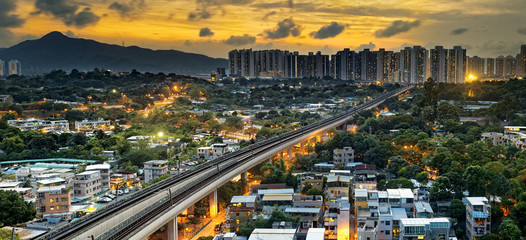 hong kong urban downtown and sunset speed train