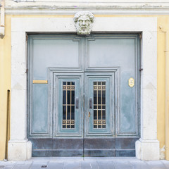 Old doorway with stone head
