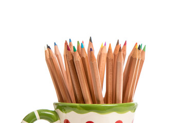 colored wood drawing pencils in a mug