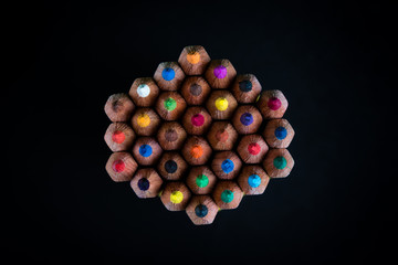 color pencils on black table