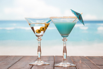 Cocktails on the sea background