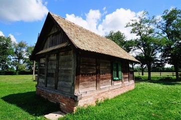 Fototapeta na wymiar Wooden cottage on the farm
