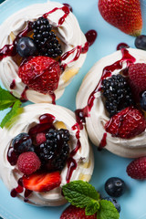 Homemade pavlova meringue with summer fresh berries