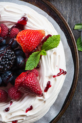 Homemade pavlova meringue with summer fresh berries