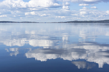 Reflection of clouds on lake water
