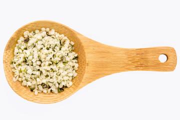 hemp seed hearts on wooden spoon