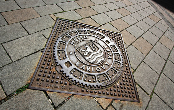 Sewer manhole with lion in the Czech town